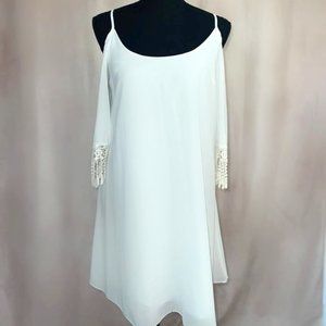 Flowy white off the shoulder bohemian style dress